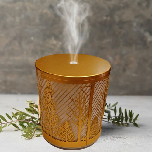 Aromadifuzor elegant, cu design aurit și motive naturale